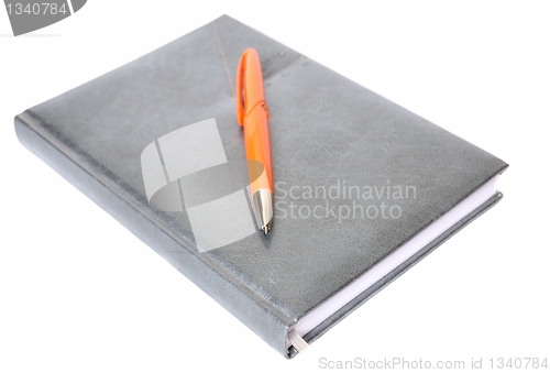 Image of The diary and pen on a white background