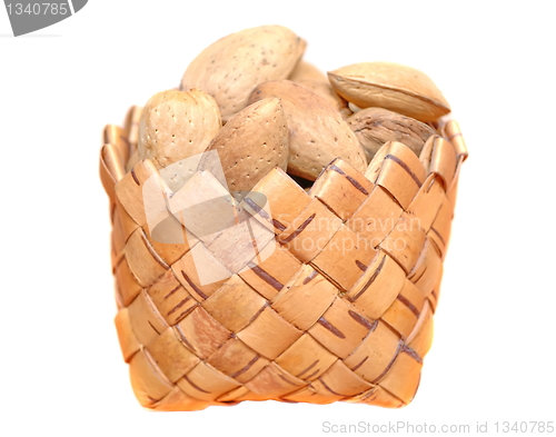 Image of Almonds in a basket on white background