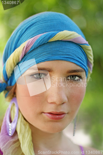 Image of Beautiful girl in blue turban