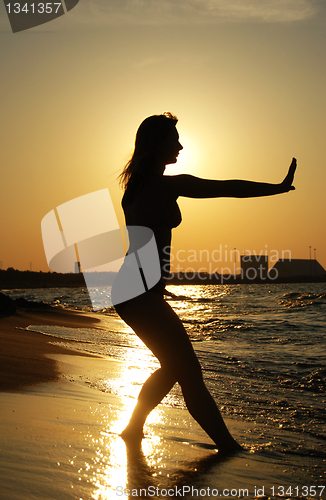 Image of Sunset Tai Chi on a beach