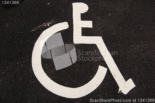 Image of Handicap sign on asphalt