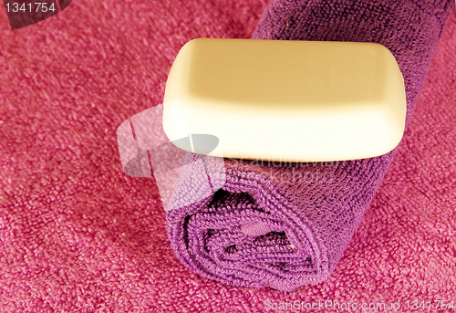 Image of Soap bar on colorful towels