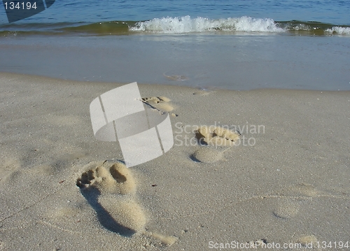 Image of Footprints on the beach sand