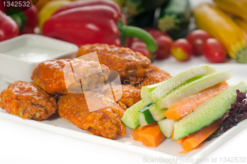 Image of  buffalo chicken wings served with pinzimonio
