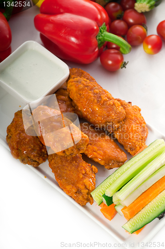 Image of  buffalo chicken wings served with pinzimonio