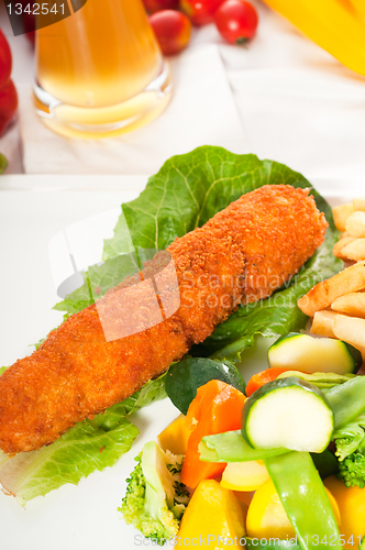 Image of fresh chicken breast roll and vegetables