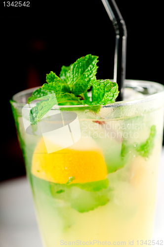 Image of mojito caipirina cocktail with fresh mint leaves