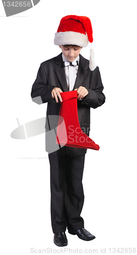 Image of Boy with red hat and red sock, isolated