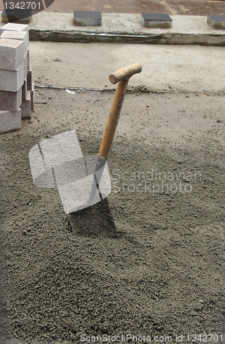 Image of shovel in the rocks