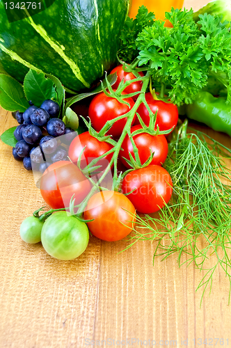 Image of Tomatoes and vegetables on the board