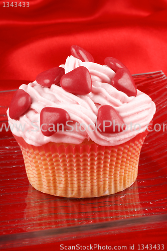 Image of Cupcake with red sugar-coated hearts