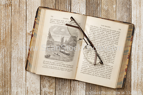 Image of antique book on a grunge table