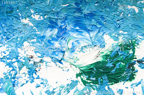 Image of paints on the white paper