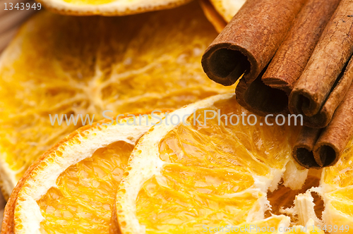 Image of Dried orange and cinnamon sticks - christmas decoration