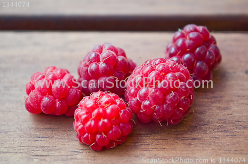 Image of five raspberries 