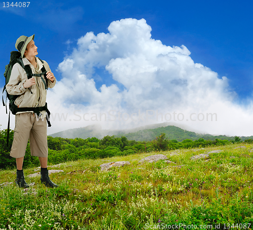 Image of young tourist on white