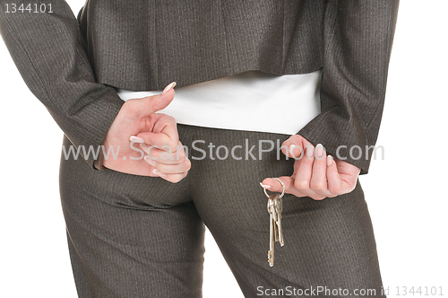 Image of young woman in office attire. 