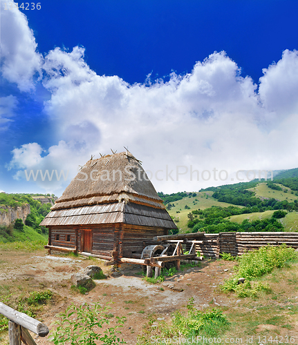 Image of cabin of poor peasant on picturesque Highlands