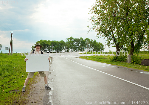 Image of tourist on a country road