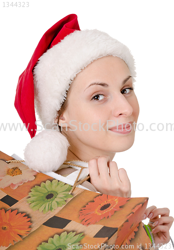 Image of girl in the hat of Santa Claus