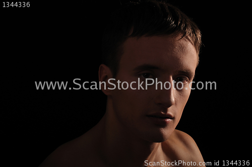 Image of young sportsman with a bare torso
