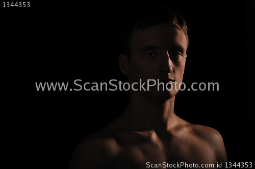 Image of young sportsman with a bare torso