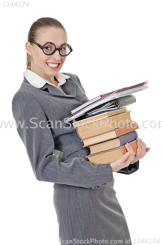 Image of portrait of a girl with a  stack of books