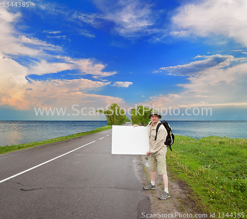 Image of tourist on a country road