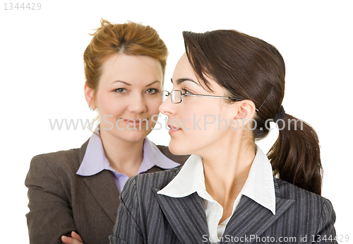 Image of portrait of two women in office clothes 