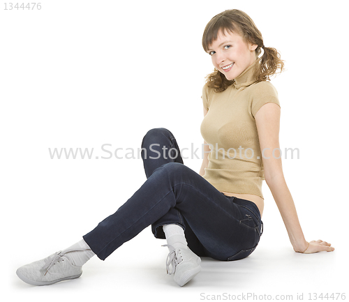Image of girl with braids wearing jeans 