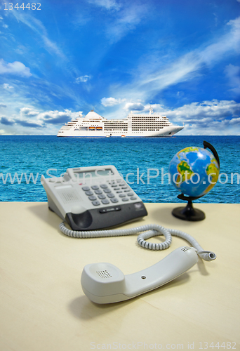 Image of office interiors and ship on the horizon