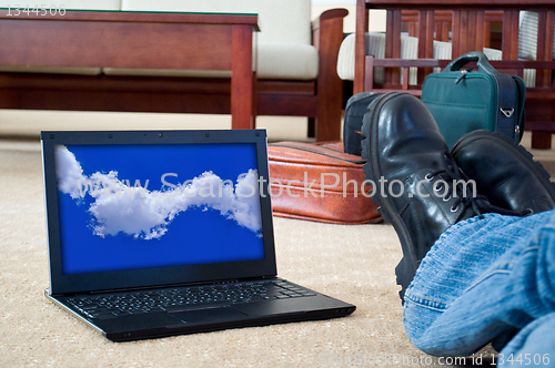 Image of notebook (laptop) on a  home interior