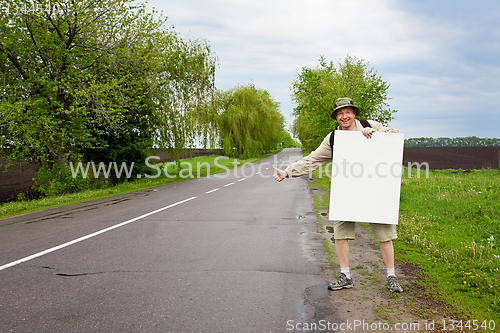 Image of tourist on a country road