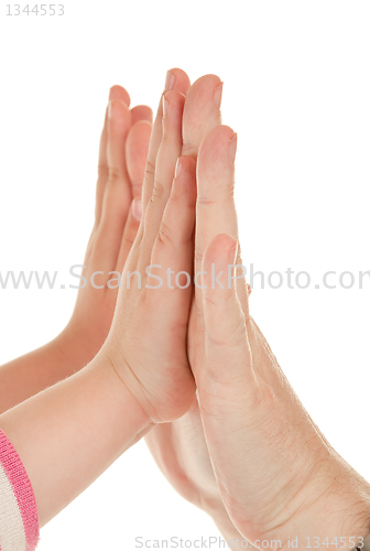 Image of Adults and children's hands