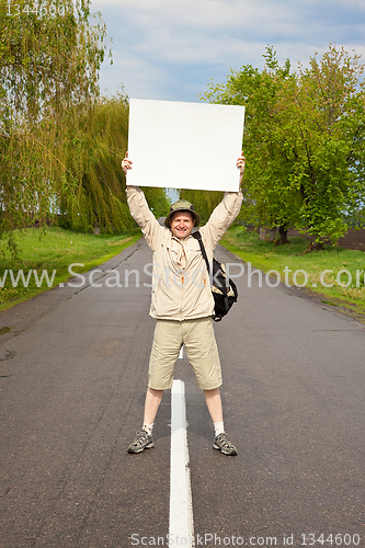 Image of tourist on a country road