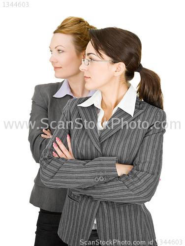 Image of portrait of two women in office clothes 