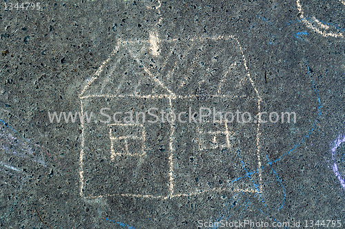 Image of child's drawing on asphalt