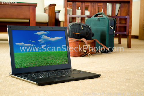 Image of notebook (laptop) on a  home interior