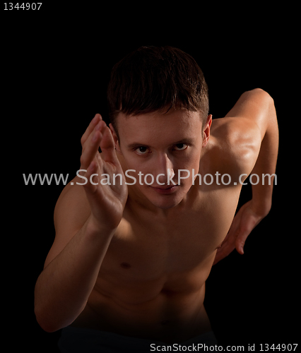 Image of young sportsman with a bare torso