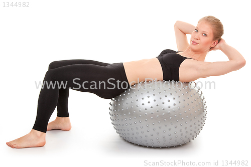 Image of athletic girl with a silver ball