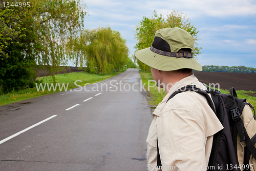 Image of tourist on a country road