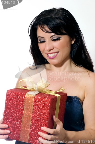 Image of Woman holding a gift.