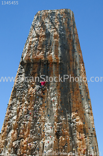 Image of Boy on a big climbing wall