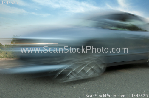 Image of High speed blurred car