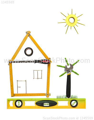 Image of House with tree and sun made of tools for building.