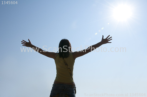 Image of Woman with outstretched arms