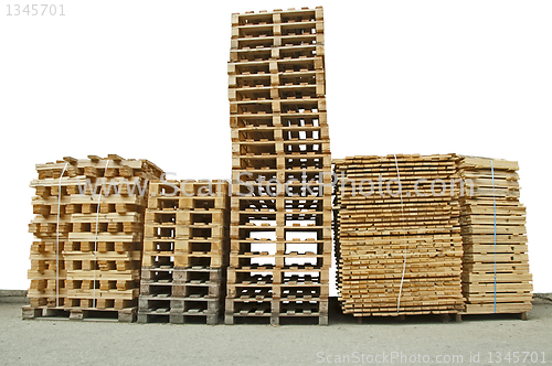 Image of Stacks of New wooden pallets