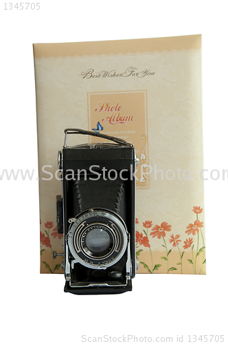 Image of Photo album and vintage camera