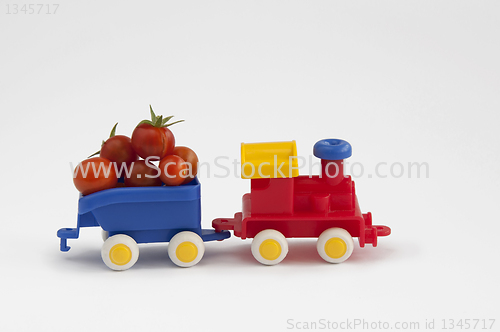 Image of Little train spends tomatoes