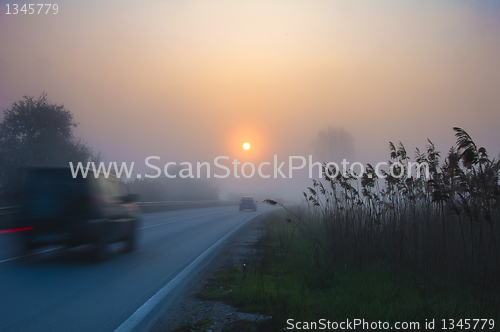 Image of Blurred car, early morning sunrise